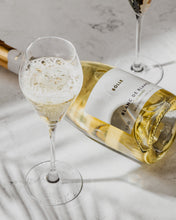 BOLLE Blanc de Blancs twice-fermented non-alcoholic wine with champagne glass showing bubbles, premium alcohol-free wine