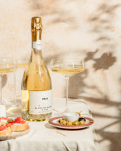 BOLLE Blanc de Blancs non-alcoholic sparkling wine with appetisers and olives, best alcohol-free champagne for entertaining